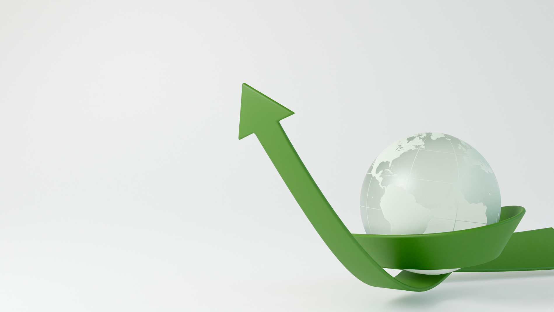 Glass globe with green arrow