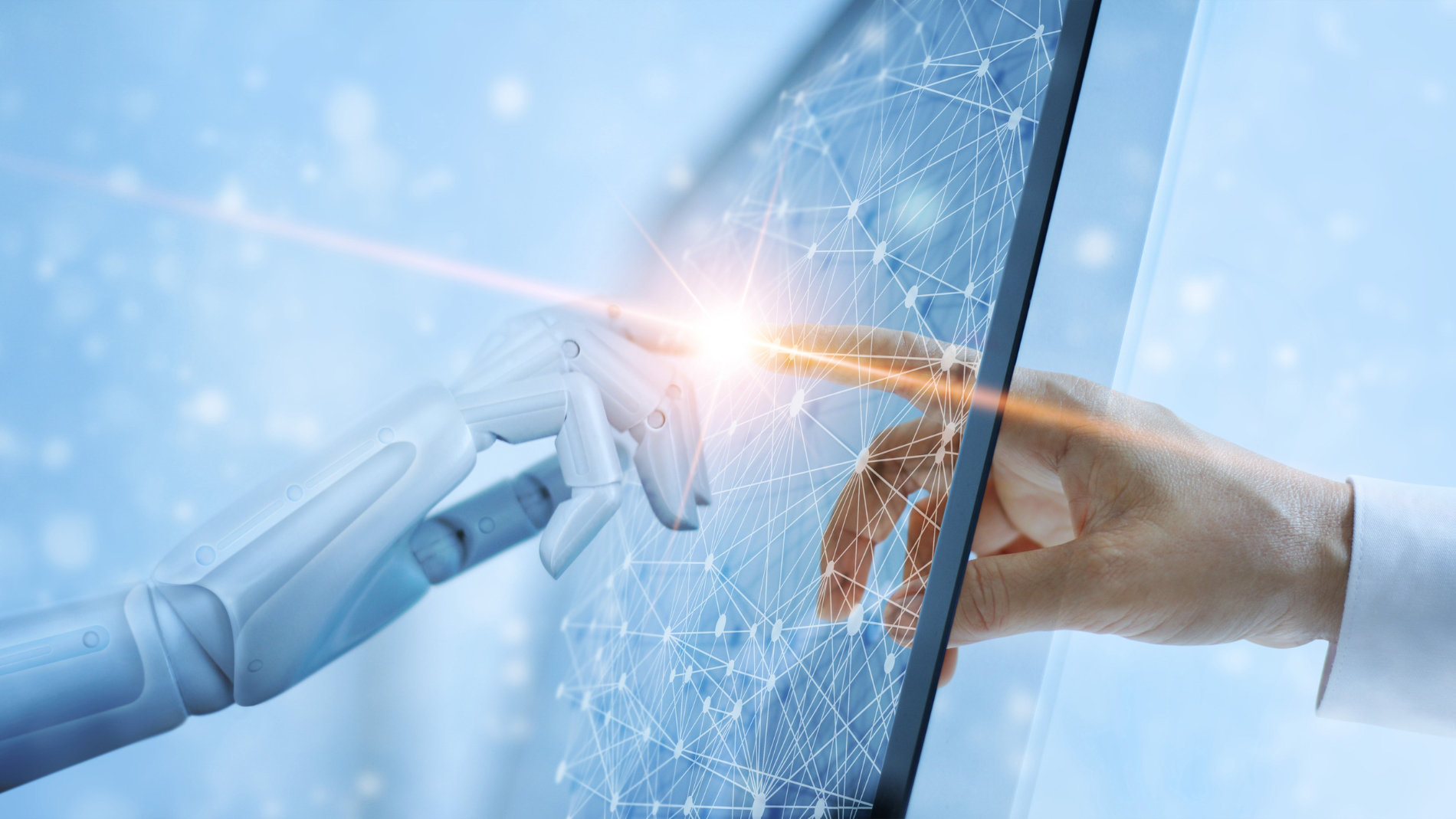 Robot hand and human hand touch each other