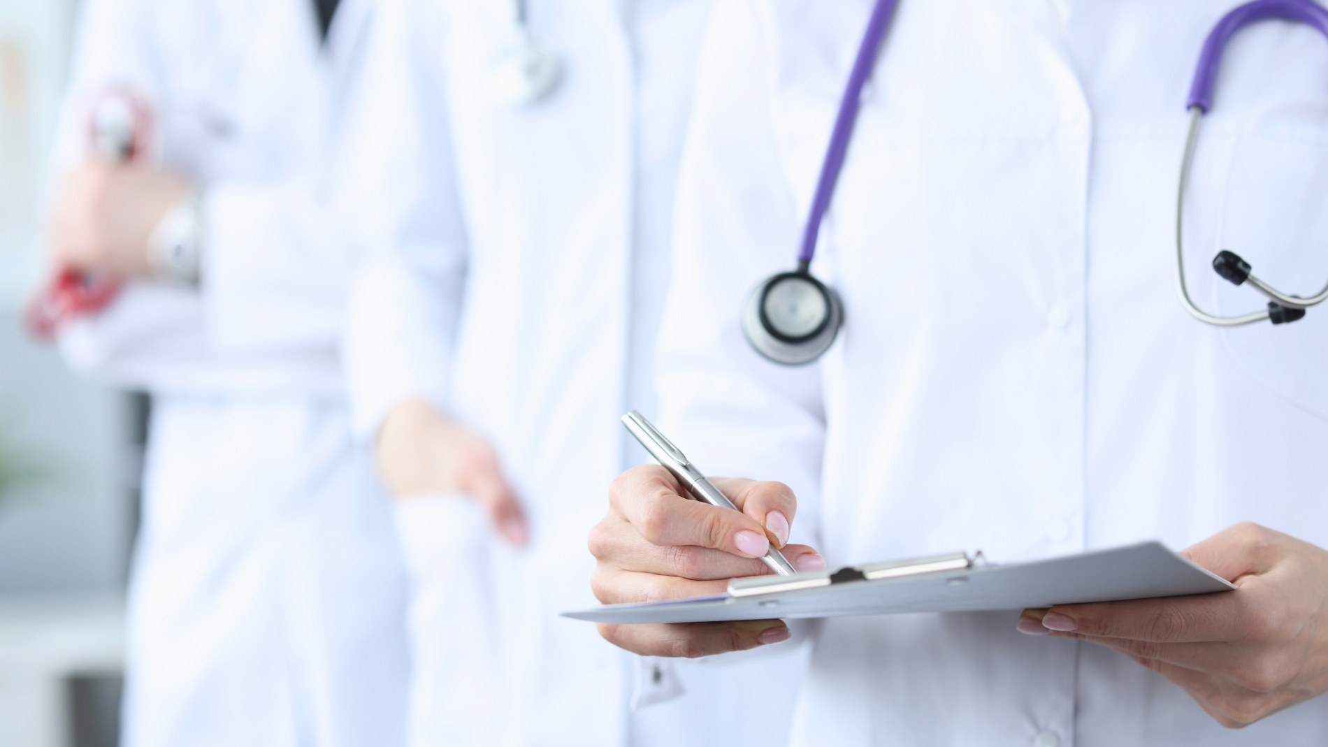 People in doctor's coats